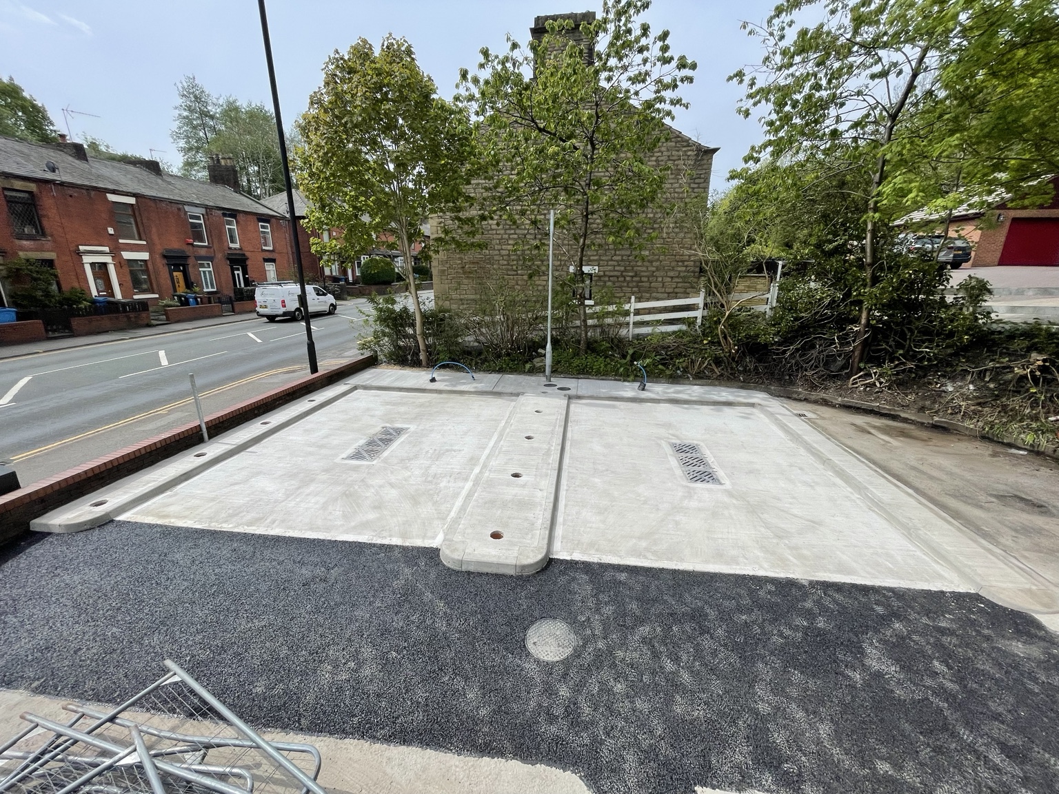 Completed concrete jet wash bays with asphalt reinstatement